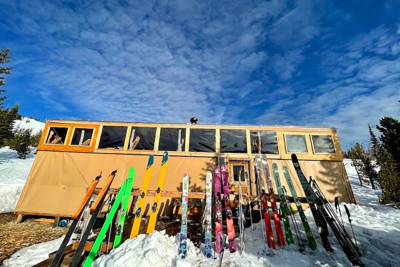 Skis lined up on the deck